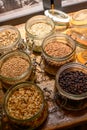 Tastes of gin, botanicals ingredients for gin distillery process, dried orange peels, juniper berries, heather, angelica,