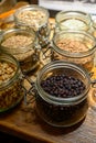 Tastes of gin, botanicals ingredients for gin distillery process, dried orange peels, juniper berries, heather, angelica,