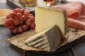 Tasting of ancient french demi soft cheese Tomme from French Alp