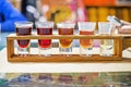 tasting of berry liqueurs. Making homemade tinctures Royalty Free Stock Photo