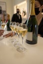 Tasting of brut champagne sparkling wine during visit caves in champagne house in Reims, France