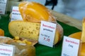 Tasting of cheeses in Dutch cheese farm shop, English translation is Farmers cheese with holes