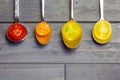 Tasting of Cherry tomatoes of different colors sliced over spoonfuls