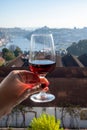 Tasting of different fortified dessert ruby, tawny port wines in glasses with view on Douro river, porto lodges of Vila Nova de Royalty Free Stock Photo