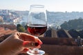 Tasting of different fortified dessert ruby, tawny port wines in glasses with view on Douro river, porto lodges of Vila Nova de Royalty Free Stock Photo
