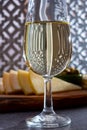 Tasting of fortified Andalusian sherry wine with traditional Spanisch tapas, green olives, goat and sheep manchego cheese Royalty Free Stock Photo