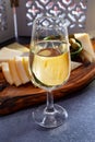 Tasting of fortified Andalusian sherry wine with traditional Spanisch tapas, green olives, goat and sheep manchego cheese Royalty Free Stock Photo