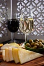 Tasting of fortified Andalusian sherry wine with traditional Spanisch tapas, green olives, goat and sheep manchego cheese Royalty Free Stock Photo