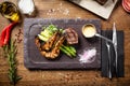 Tasting menu. Beef steak and grilled tiger prawns. Royalty Free Stock Photo