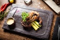 Tasting menu. Beef steak and grilled tiger prawns. Royalty Free Stock Photo