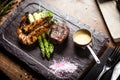 Tasting menu. Beef steak and grilled tiger prawns. Royalty Free Stock Photo