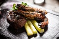 Tasting menu. Beef steak and grilled tiger prawns. Royalty Free Stock Photo