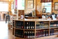 Tasting room with several shelves of bottles of wine and hard cider, Critz Farms Brewing and Cider Company,