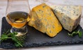 Tasting of Scottish single malt or blended whisky with English cheeses blue stilton and shropshire