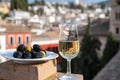 Tasting of Spanish sweet and dry fortified Vino de Jerez sherry wine and olives with view on roofs and houses of old andalusian Royalty Free Stock Photo