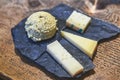 Tasting of three typical mountain cheeses from northern Italy