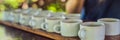 Tasting various types of coffee and tea, including coffee Luwak BANNER, long format