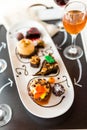 Tasting of wine and pattie chocolate pastries at the chocolate. Royalty Free Stock Photo