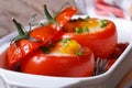 Tasty appetizer of baked tomatoes stuffed with eggs