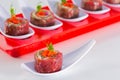 tasty appetizer. Beef carpaccio with salad leaves and vegetabales. Royalty Free Stock Photo