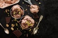 Tasty appetizing chocolate ice cream with mint and pistachios in