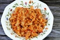 tasty appetizing classic pasta fusilli macaroni plate with tomato sauce, garlic, onion, spices, oil and black pepper, selective Royalty Free Stock Photo