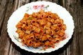 tasty appetizing classic pasta rings macaroni plate with tomato sauce, garlic, onion, spices, oil and black pepper Royalty Free Stock Photo