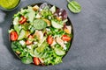Tasty fresh salad with chicken, pesto and vegetables Royalty Free Stock Photo