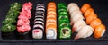 Tasty appetizing multicolored sushi rolls set with wide assortme Royalty Free Stock Photo