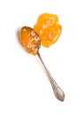 Tasty apricot jam in spoon. Royalty Free Stock Photo