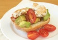 Tasty avocado, tomato and chicken bruschetta Royalty Free Stock Photo