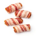 Tasty bacon wrapped items isolated on white background