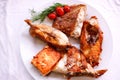Tasty baked fish with cherry tomatoes and fresh Royalty Free Stock Photo