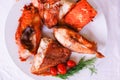 Tasty baked fish with cherry tomatoes and fresh Royalty Free Stock Photo