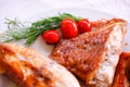 Tasty baked fish with cherry tomatoes and fresh Royalty Free Stock Photo