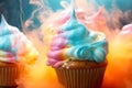 Tasty baking cupcake or muffin with cream icing, frosting, bright colored sprinkles. Rainbow Birthday cupcake with a sparkler and