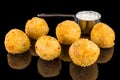 Tasty balls from rice and cheese with reflection Royalty Free Stock Photo