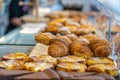 Tasty and beautiful golden croissants and pastry at bakery Royalty Free Stock Photo