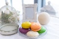 Tasty beautiful macaroons on a beautiful table in the style of P