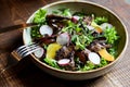 Beef salad with radish, peach and green vegetables