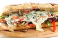 Tasty beef steak sandwich with onions, mushroom and melted provolone cheese Royalty Free Stock Photo