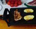 Tasty Beefsteak and Caliu potatoes on a electric griddle