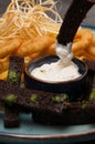 Beer snacks: onion rings, garlic croutons, cheese with sour cream sauce. Close-up Royalty Free Stock Photo