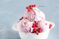 Tasty Berry Ice Cream in a Small Bowls with Berries Blue Background Horizontal Strawberries Ice Cream Close Up