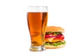 tasty big burger and glass of beer isolated Royalty Free Stock Photo