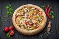 Tasty and big pizza with different types of meat Royalty Free Stock Photo