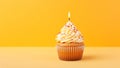 Tasty birthday cupcake with a candle on a yellow background. Mini cake. Ai generative