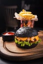 Tasty black burger with shrimp Royalty Free Stock Photo