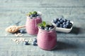 Tasty blueberry smoothie in jars, berries Royalty Free Stock Photo