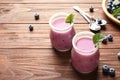 Tasty blueberry smoothie in jars, berries Royalty Free Stock Photo